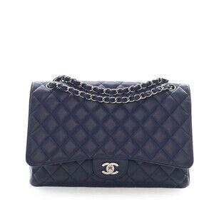 Pre-Loved Chanel Maxi Classic Caviar Double Flap